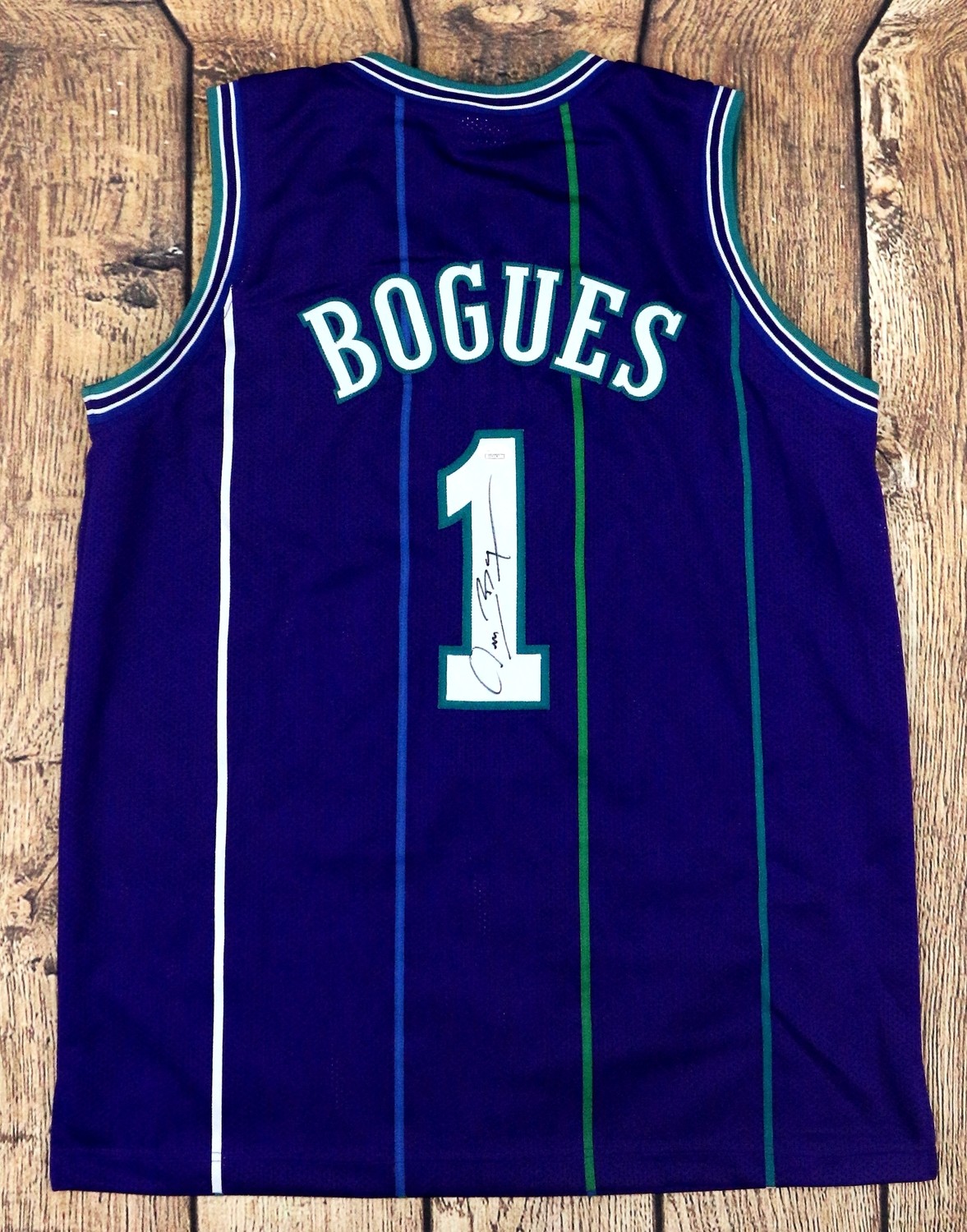 muggsy bogues purple jersey